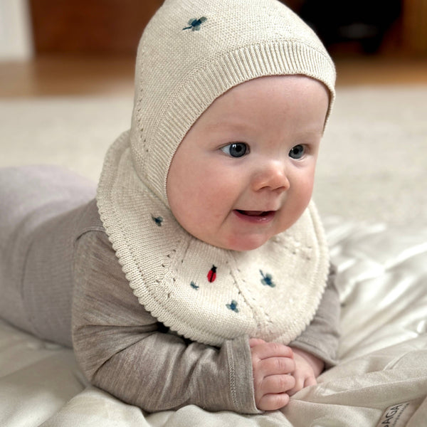 Ladybug Garden Knitted Organic Cotton Bib by Saga Copenhagen
